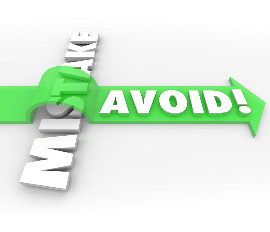 Avoid Mistake words in 3d letters and a green arrow over the word to illustrate preventing a problem, error, difficulty or inaccuracy